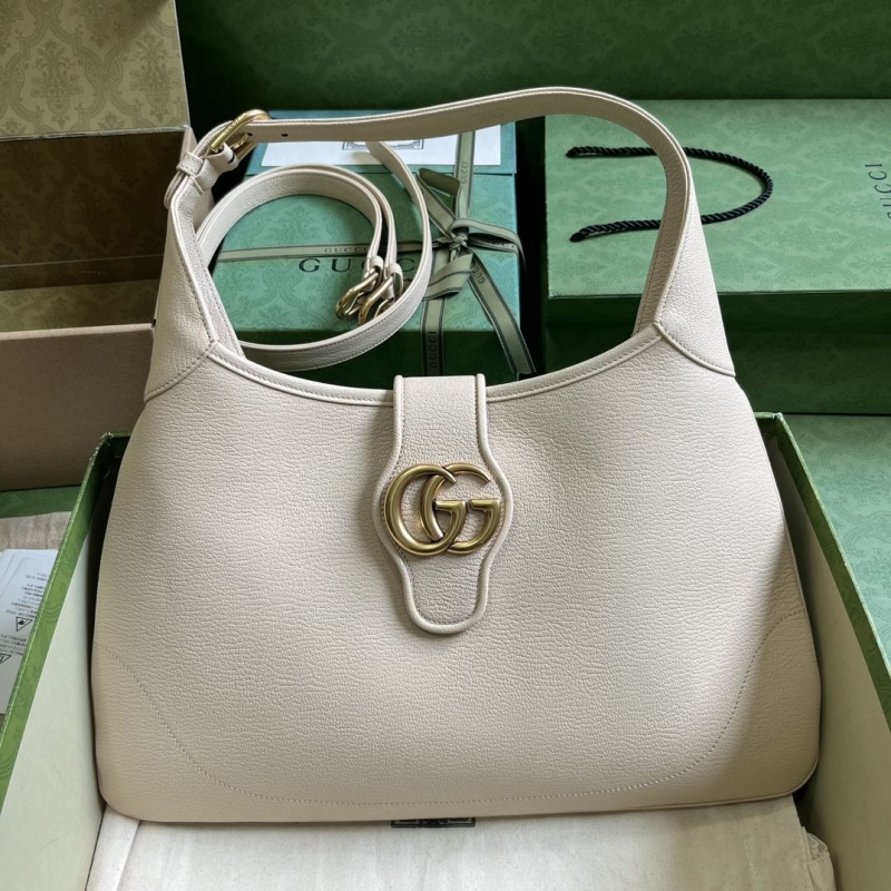 G*u*i top handle bags